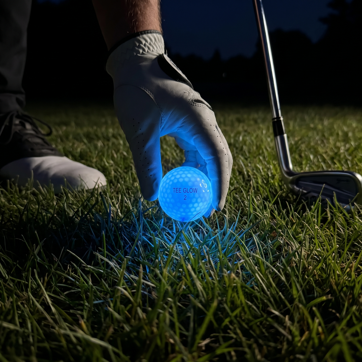 Picking up a glowing ball from the rough